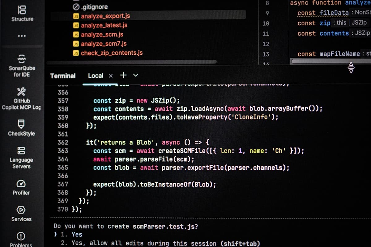 Computer screen displaying code editor and terminal output side by side — developer environment for observability and monitoring