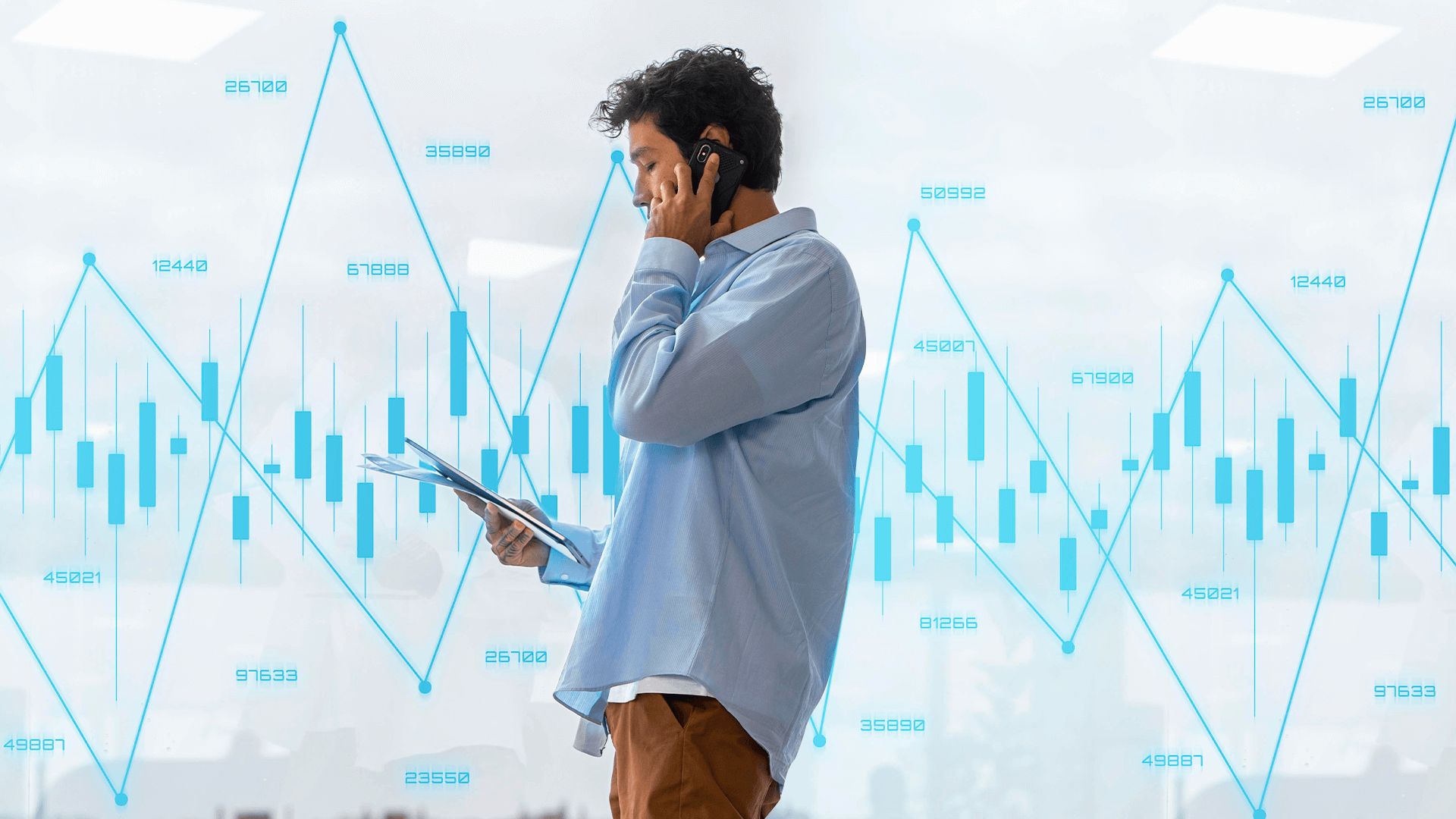 A imagem mostra um homem falando no celular com gráfico ao fundo, simbolizando a relevância de se manter atualizado nas tendências financeiras.